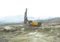 Atlas Copco drilling in to the ground