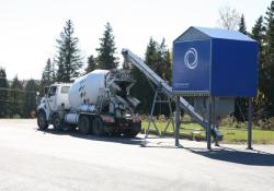 Mixer truck dispensing at plant