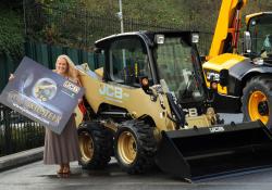 Joanne McAdam with JCB skid steer loader 