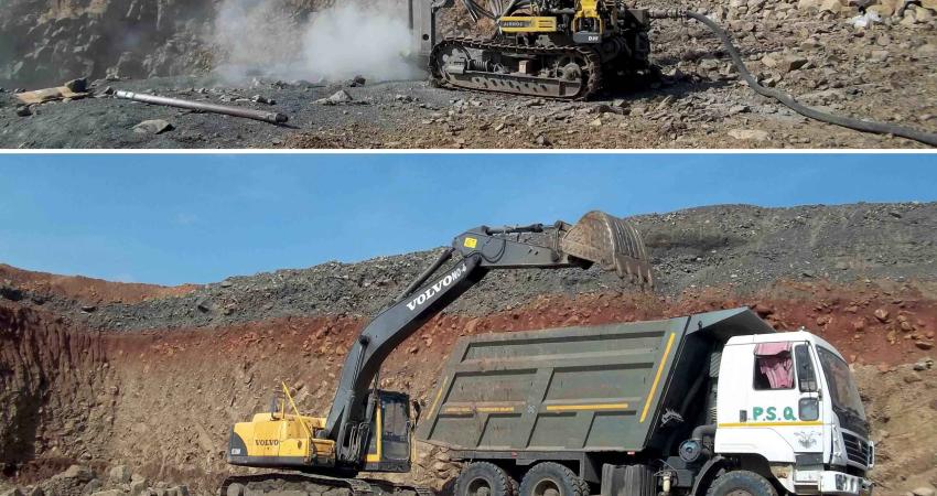 Atlas Copco surface rock drill and Volvo excavator 