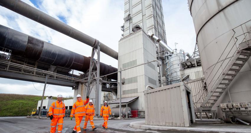 From left: Hanson UK CEO Simon Willis, David TC Davies MP, Minister for Wales, Padeswood cement works plant manager David Quick and Iain Walpole, Hanson’s head of process and sustainability – CCS, at Hanson’s Padeswood facility