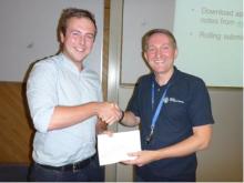 Kieran Blacker receiving the EIG 2014 Scholarship Award