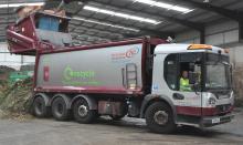 Derbyshire County Council waste vehicle drops off a load 