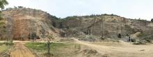 Volvo excavators in the Alam Jaya volcanic rock quarry 