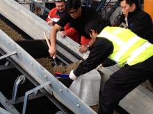 Sand material being collected by employees of Chung Kang Aggregate Enterprise