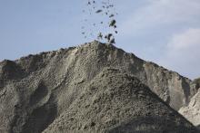 A manufactured sand stockpile at an Asian aggregates materials processing site.jpg