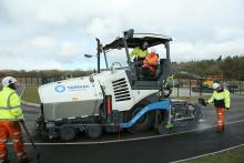 HRH The Duke of Cambridge tries out a paving machine at the new centre