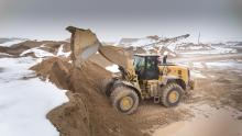 A Cat 982 XE wheeled loader at work in a quarry