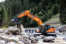 A Doosan DX120-7 in action