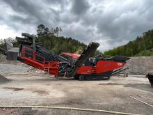 SBM Mineral Processing’s new AI-featuring REMAX 600 impact crusher during its official launch in Ramsau 