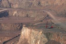 driller in red quarry