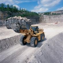 Wheeled loader carrying aggregates