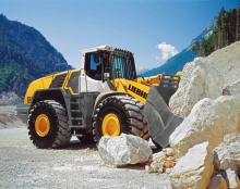 Liebherr wheeled loader moving large rocks 