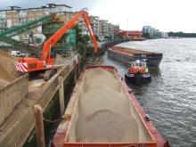 Filling barge with sand for beach nourishment 