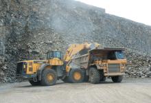 Baslt rock emptied in to truck at quarry site 