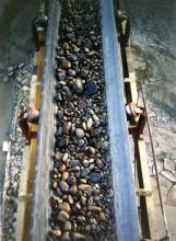 washed aggregates on a conveyer belt