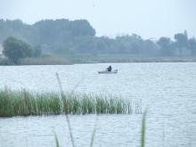 man rowing boat in Chipintsi lake