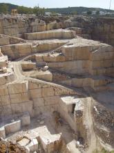 Marble quarry with excavator