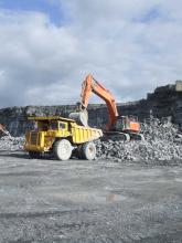 Excavator and Hauler at work