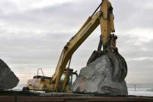 Shifting aggregate for use in coastal defenses in Wales