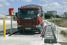 Truck having its load weighed on a weighbridge