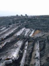 Extracting black limestone layer to get to the blue limestone underneath