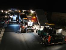 Resurfacing the A99 near Munich after dark