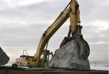 Shifting aggregate for use in coastal defenses in Wales