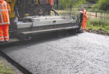 Asphalt laying machine