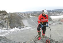 man planting explosives