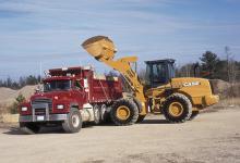 case loader loading a truck