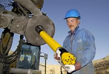 man loading hammer rig