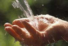 hand catching water