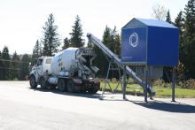 Mixer truck dispensing at plant