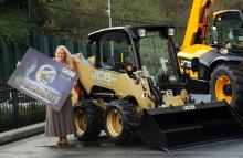 Joanne McAdam with JCB skid steer loader 