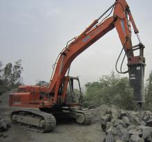 Mounted on an Hitachi excavator, the Sandvik BA2424 breaker