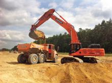 Doosan DX490LC-3 crawler excavator and DA30 ADT 