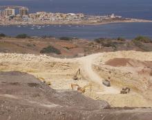 A Chicago Pneumatic RX46 breaker excavates rock in Malta