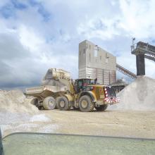 Caterpillar 980K wheeled loader with Cat 740B ADT