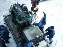 Mechanics with Volvo Penta engine at Centre Kvartet 