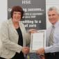 Martin Isles receives a signed "recommitment to Target Zero" certificate